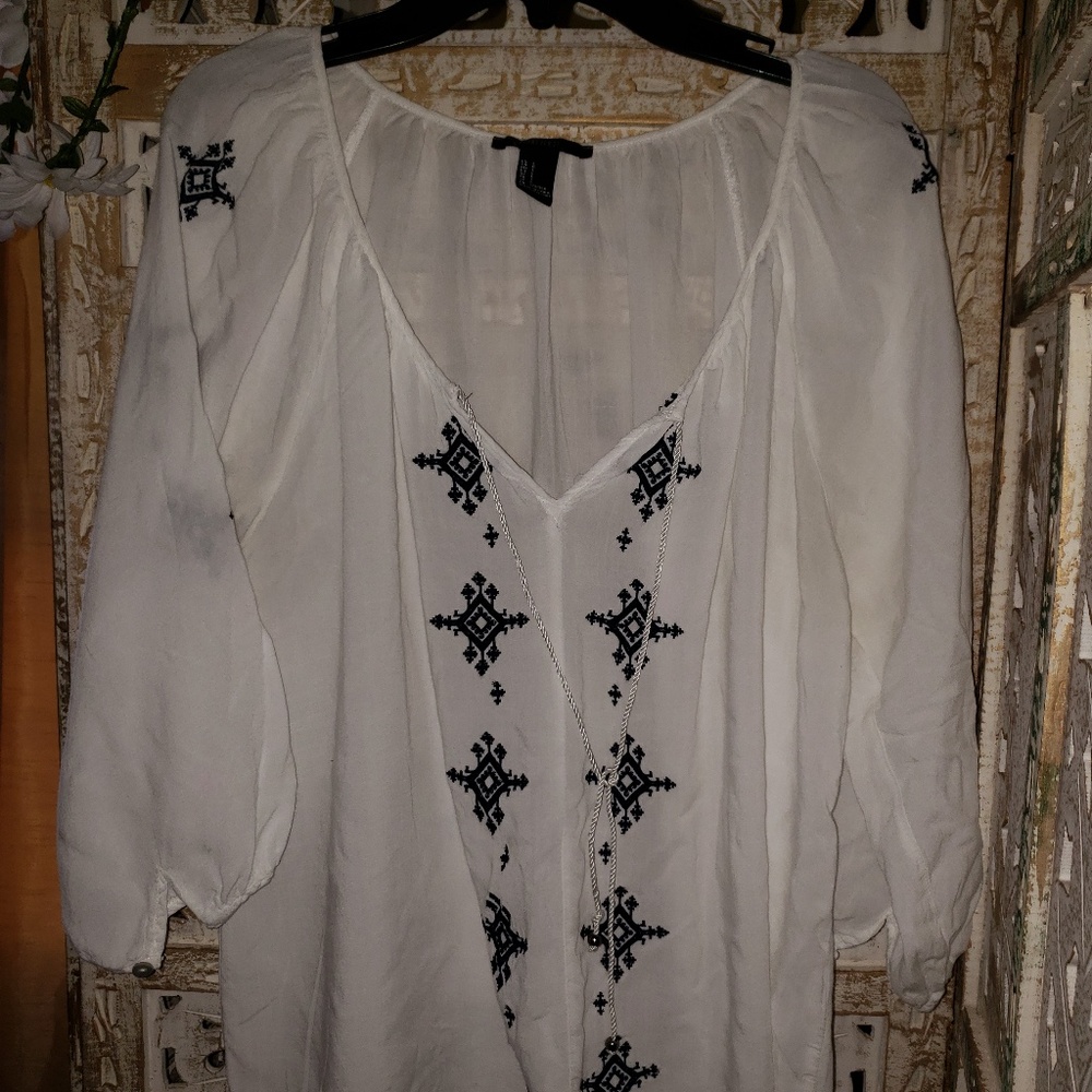 White and blue blouse